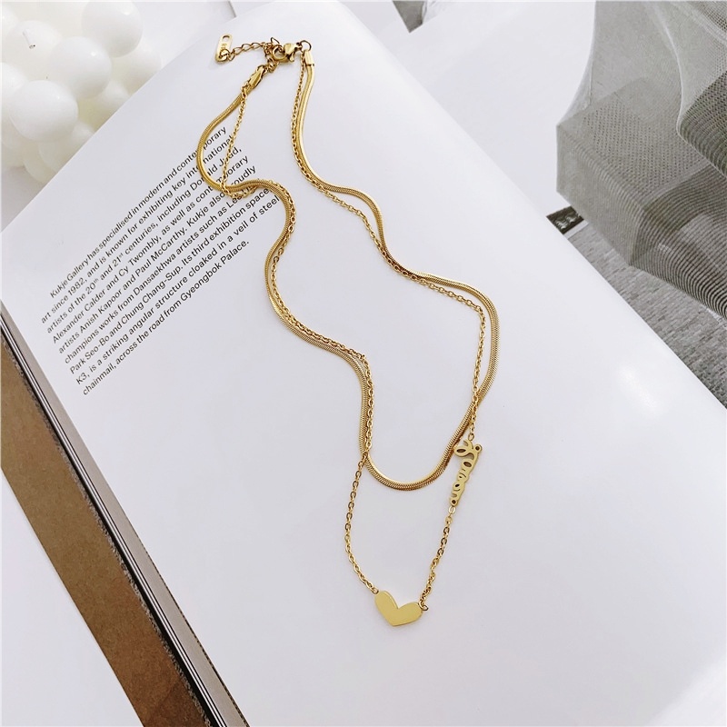 Dây chuyền titan nữ 2 lớp mặt trái tim chữ Love cá tính
