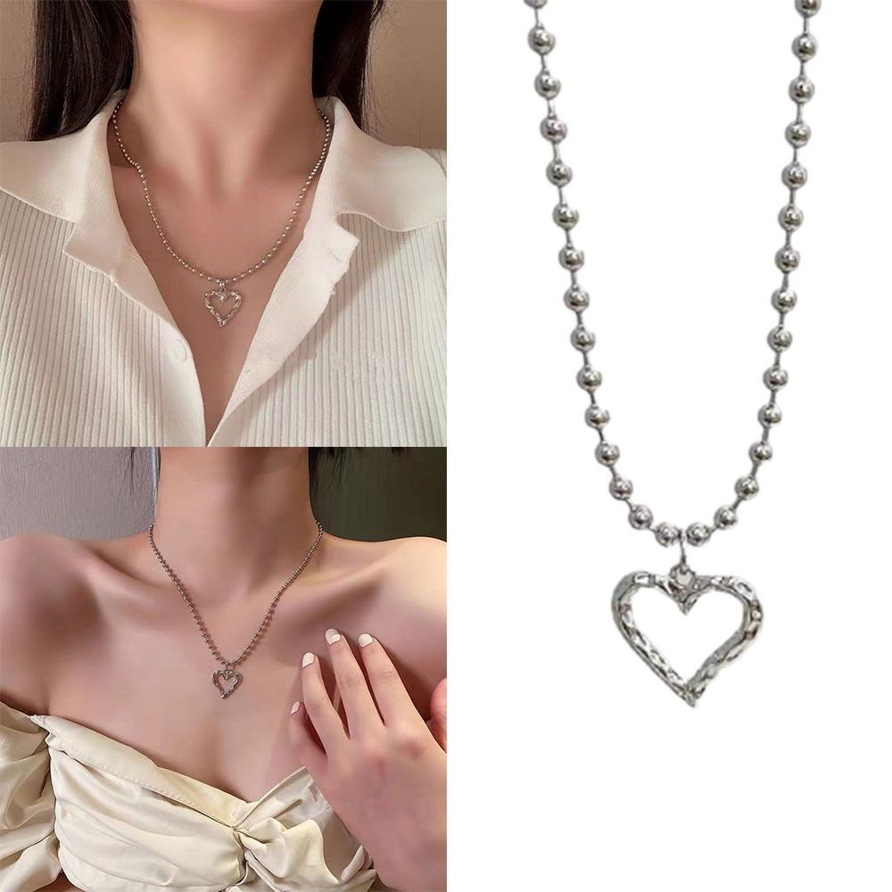 Vòng cổ kim loại mặt hình trái tim thời trang sành điệu cho nữ