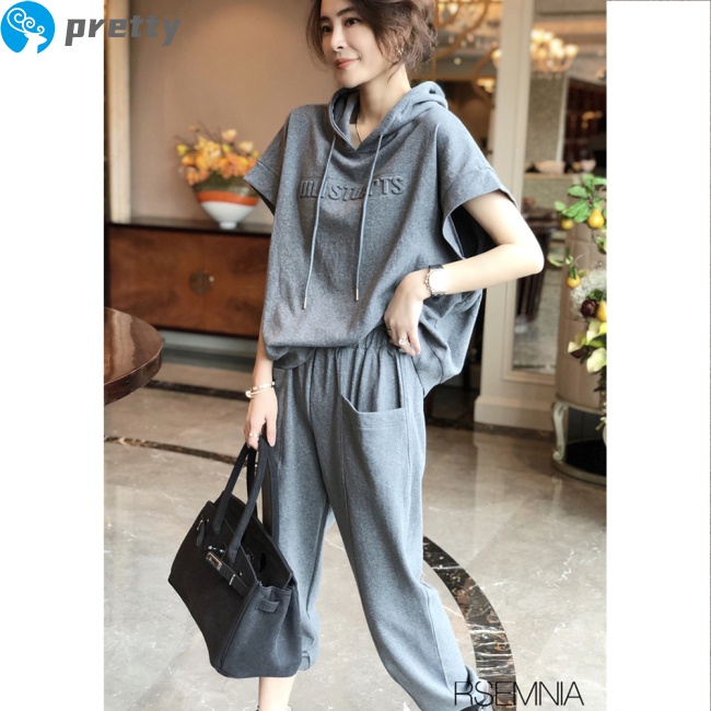 Set đồ thể thao 2 món gồm áo thun tay ngắn và quần dài có túi thời trang cho nữ