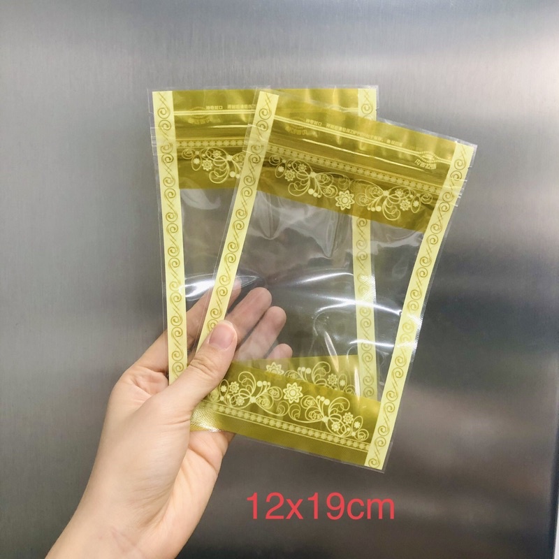 1KG Túi zip đáy đứng in bông hoa vàng/đỏ đựng đồ ăn vặt