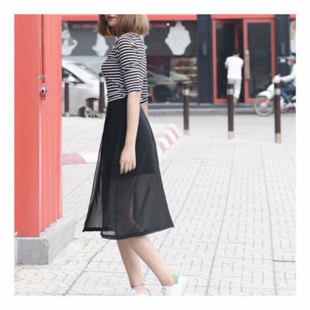 Chân váy DA xẻ tà 1 bên dài qua gối  .