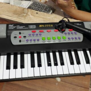 Đàn organ có mic co bé