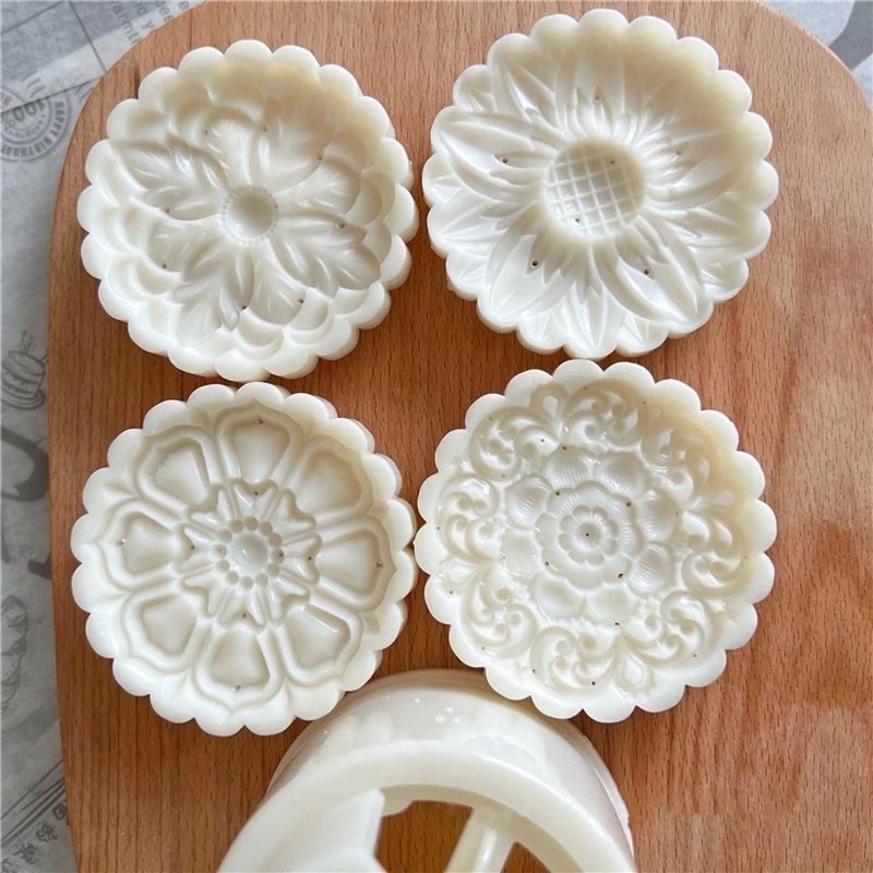 Khuôn trung thu lò xò 4 mặt hoa 150g/200g năm 2022