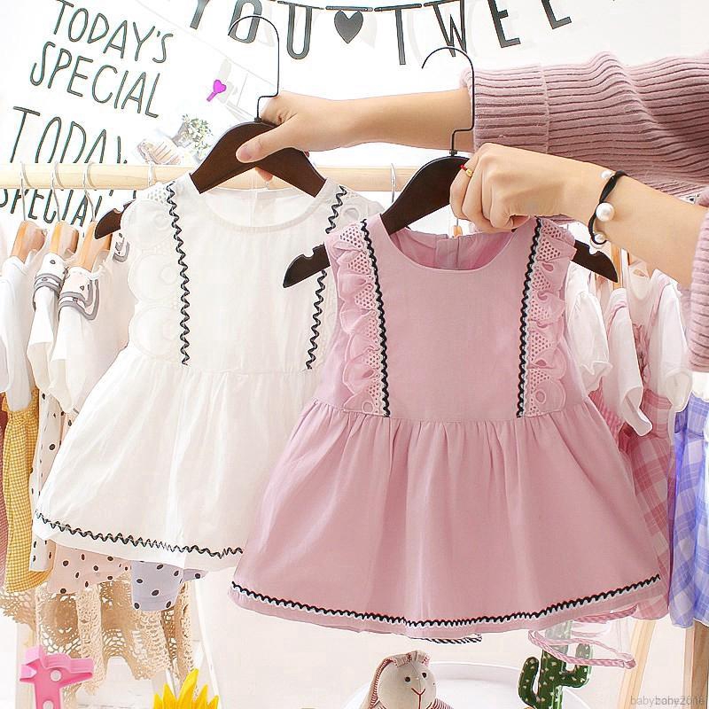 Đầm cotton màu trơn chạy viền nhỏ phối ren dễ thương cho bé gái