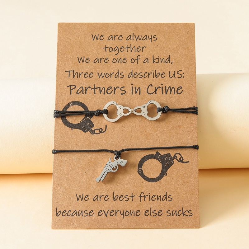 Vòng Cổ Choker Bằng Thép Không Gỉ Hình Còng Tay Và Súng Lục Độc Đáo