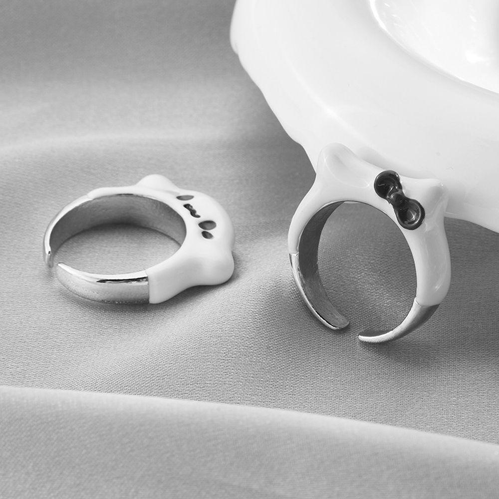 Nhẫn Hở Mặt Hình Cún Đeo Nơ Tráng Men Dễ Thương