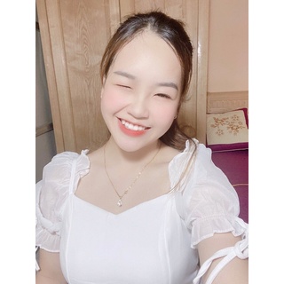 Đầm trắng thắt nơ tay bồng (mã 206)