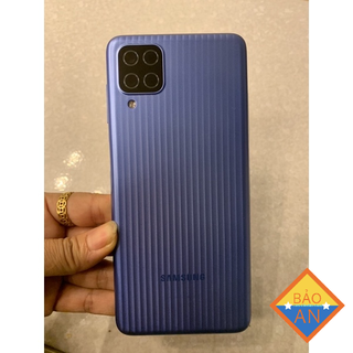 Bộ vỏ samsung M12 -zin ( gồn có khe sim ,kính cam)