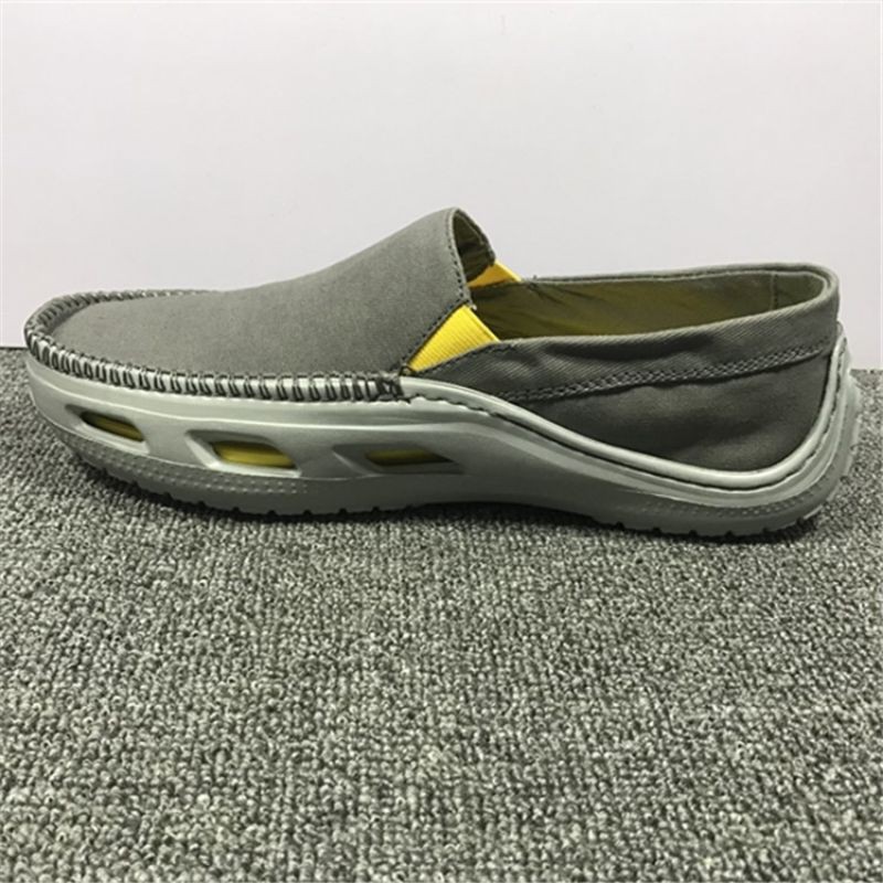 GIÀY  LƯỜI VẢI  CROSS TIDELINE SLIP ON CHO NAM MÀU XÁM