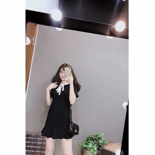 Đầm đen nơ trắng