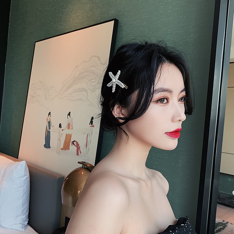 Kẹp tóc hình sao biển đính ngọc trai giả thời trang cho nữ