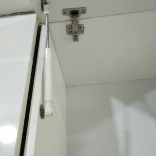 Pittong nâng cánh tủ