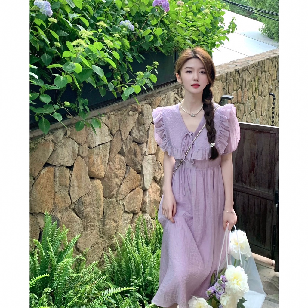 Đầm tím pastel đi biển đũi tơ cổ v hot hit đính nơ - Váy maxi tơ dáng dài màu tím dạo phố xinh xắn