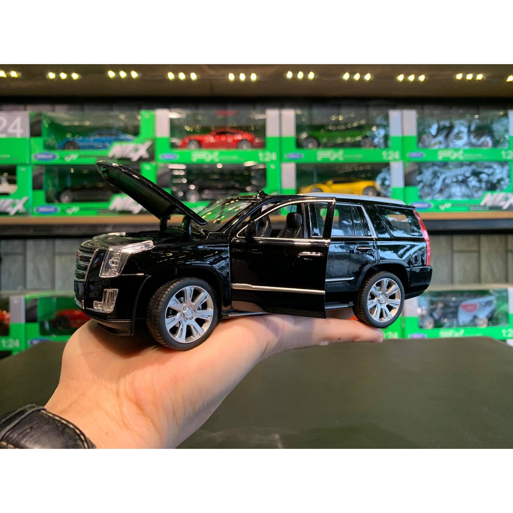 Mô hình xe ô tô Cadillac Escalade hãng Welly FX tỉ lệ 1/24 màu đen