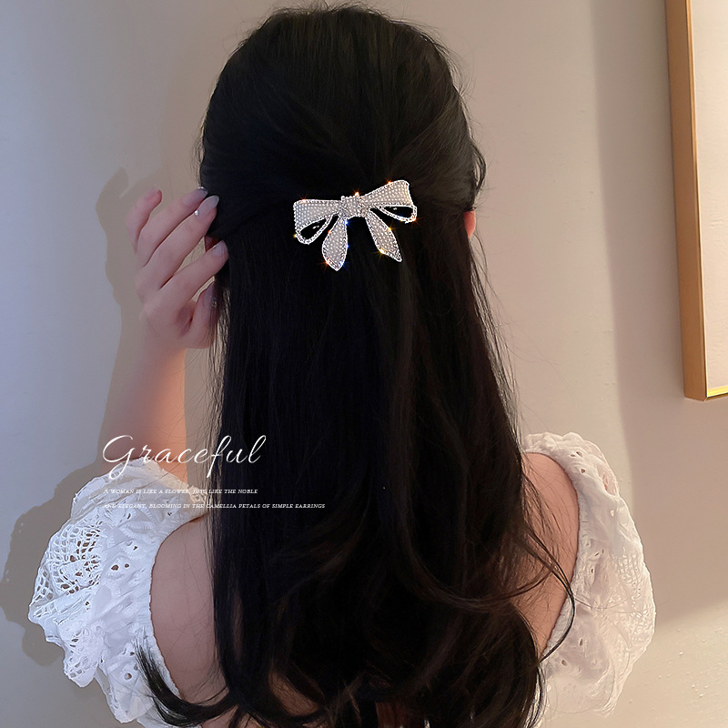 Kẹp tóc hình nơ đính ngọc trai thời trang Hàn Quốc