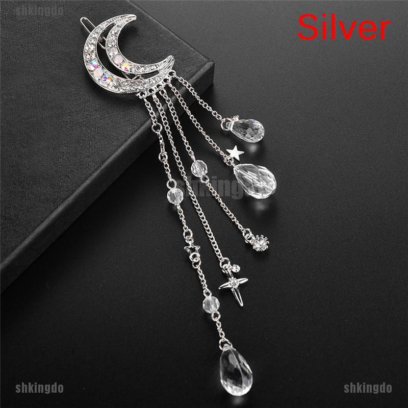 Kẹp tóc hình mặt trăng đính pha lê phối tua rua dài thời trang