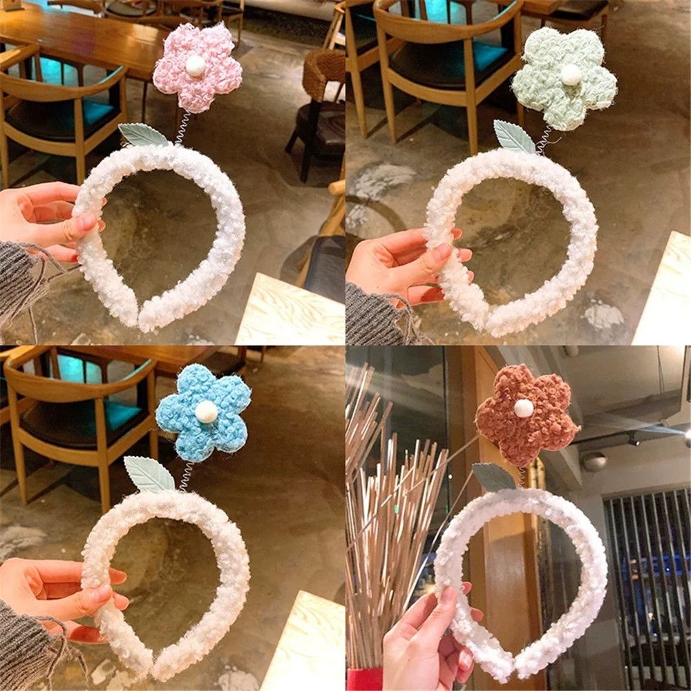 Băng đô bằng len đính hoa dẽ thương