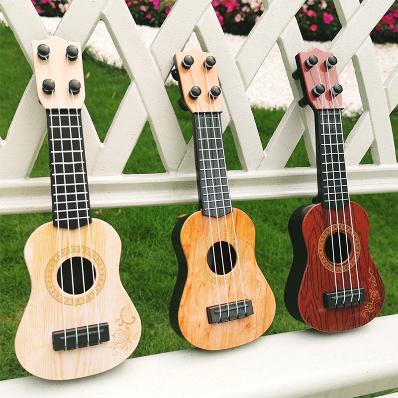 Đàn guitar đồ chơi mini bằng gỗ màu sắc xinh xắn thích hợp cho bé mang tính giáo dục từ sớm