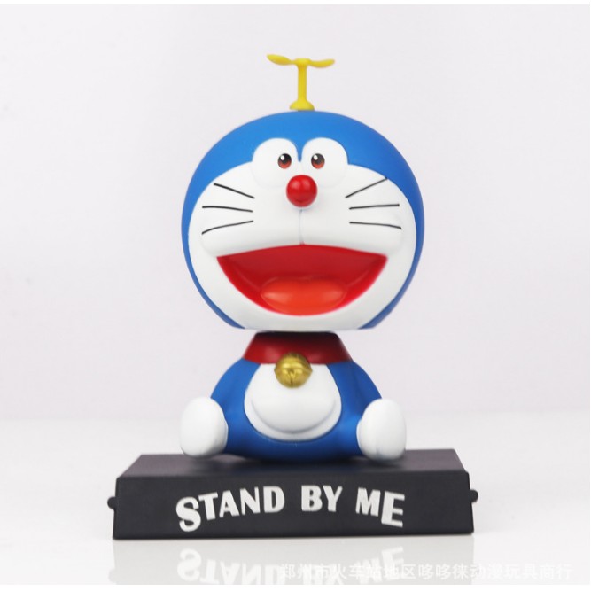 KHO-HN * Búp bê Doraemon đầu gật gù để trang trí bàn học, táp lô xe hơi