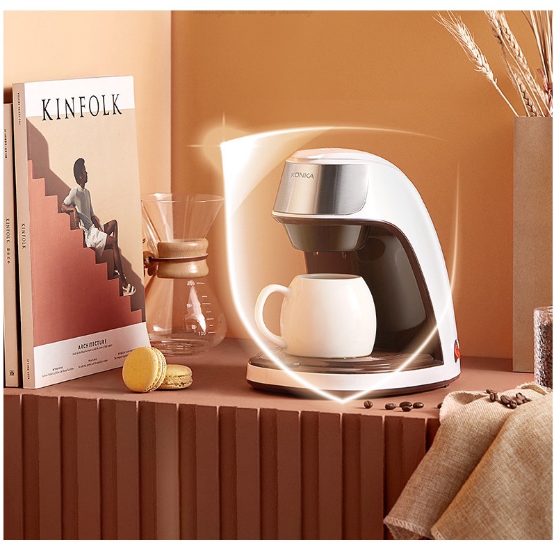 Máy pha cà phê KONKA kèm cốc sứ như hình, máy pha ra 1 cốc cà phê tầm 200ml, pha trà, trà hoa...