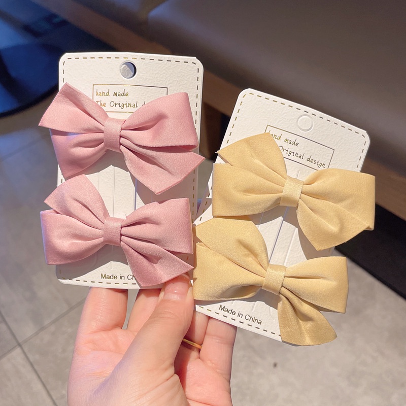 Set 2 Kẹp Tóc Ruy Băng Thắt Nơ Màu Trơn Bằng Vải Phong Cách Hàn Quốc Dành Cho Bé Gái