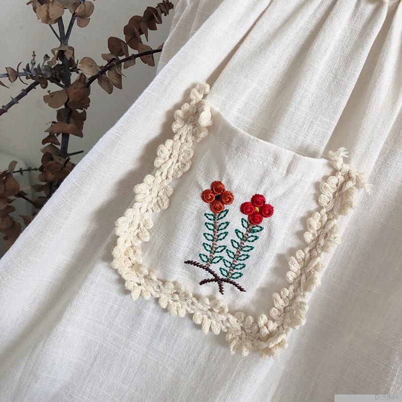 Đầm sát nách thêu hoa cho bé gái