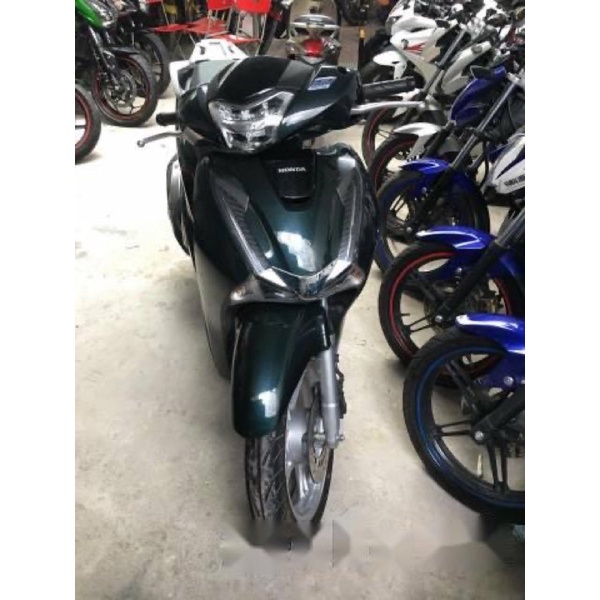 Decal 3 lớp mầu xanh lục chuyên dán đổi màu ô ô,xe máy,máy tính,dán trang trí.