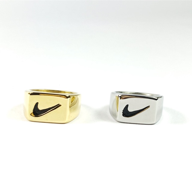 Nhẫn titan thời trang,nike mặt chữ nhật bản vàng và bạc