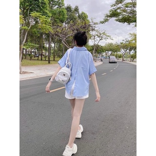 Set sơmi nút sau và short trắng