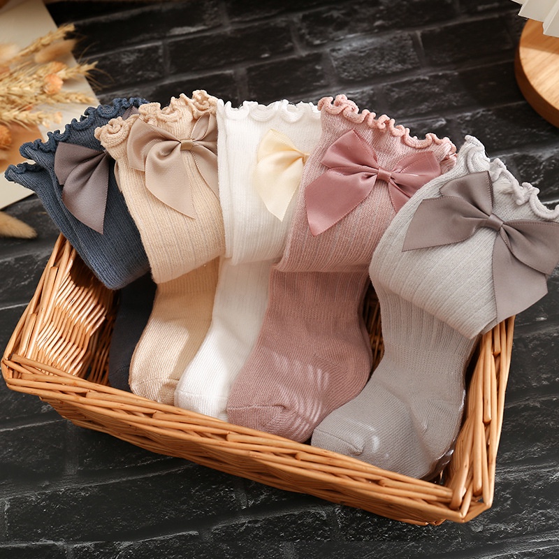 Đôi vớ dài cao tới gối mềm mại co giãn đính nơ diềm xếp nếp thời trang thu đông kiểu công chúa dành cho bé gái
