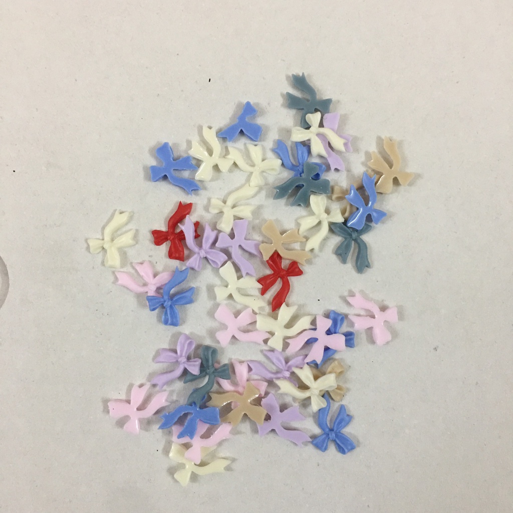 Set charm nơ xinh làm nail