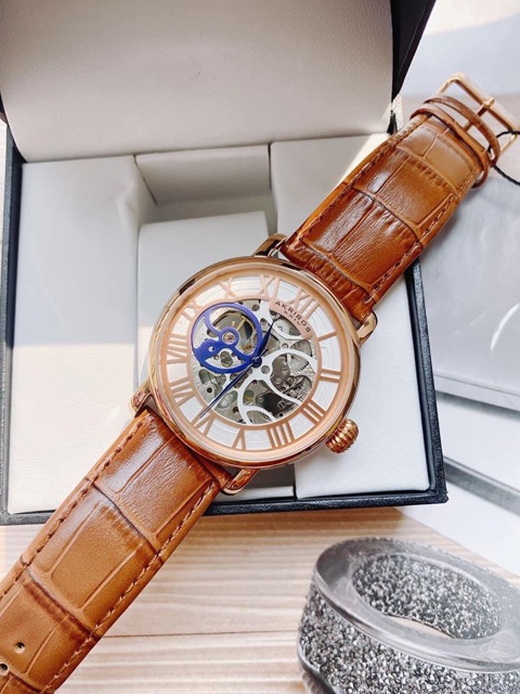 Đồng Hồ Akribos Chính Hãng Nam AK540RG XXIV Manual Wind Skeleton Dial Rose Gold-Tone Men’s Watch