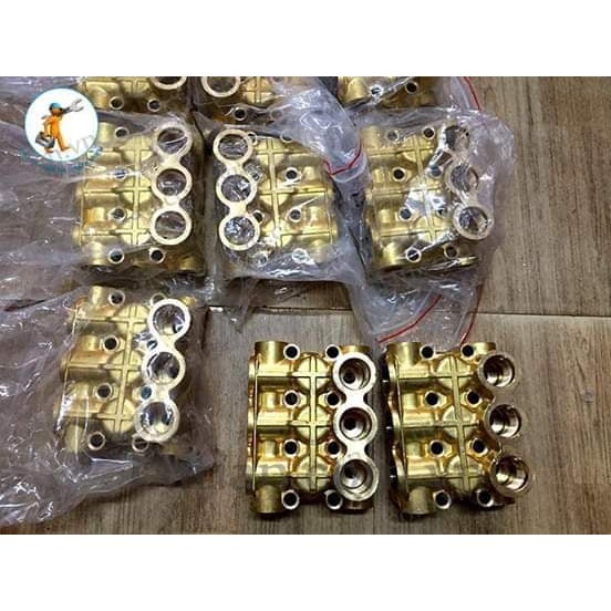 Mặt đồng máy rửa xe cao áp