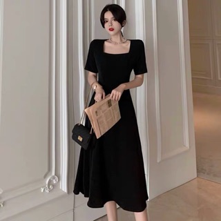 Váy xoè hở lưng thắt nơ
