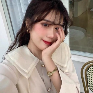 Áo sơ mi màu be cổ lá 2 tầng