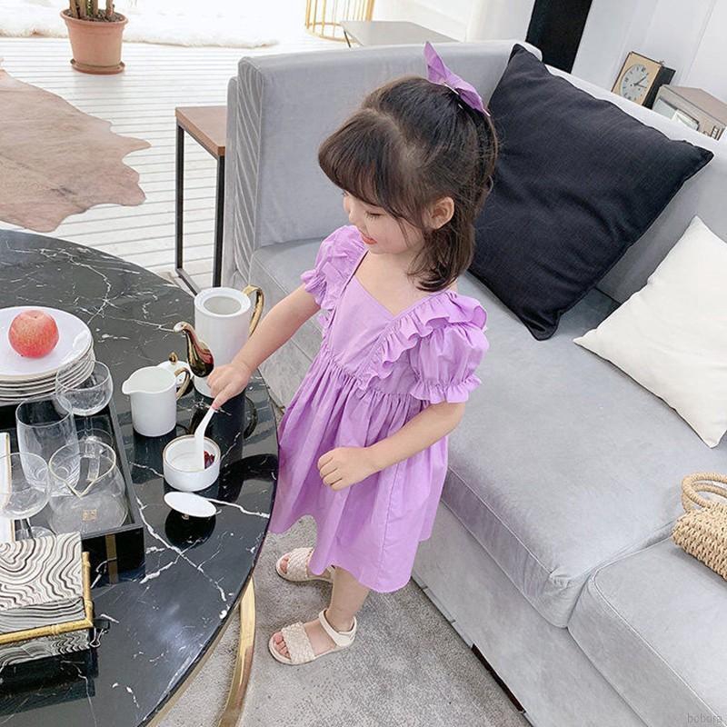 Đầm xòe chấm bi tay ngắn + kẹp nơ cho bé gái
