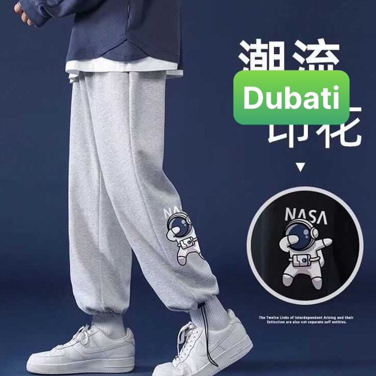 QUẦN JOGGER NAM NỮ UNISEX CHẤT NỈ DÀY DA CÁ ỐNG SUÔNG RỘNG IN HÌNH NASA RÚT DÂY TREND HOT 2022 -DUBATI FASHION