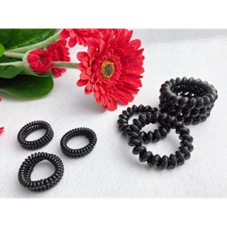 Cột tóc lò xo