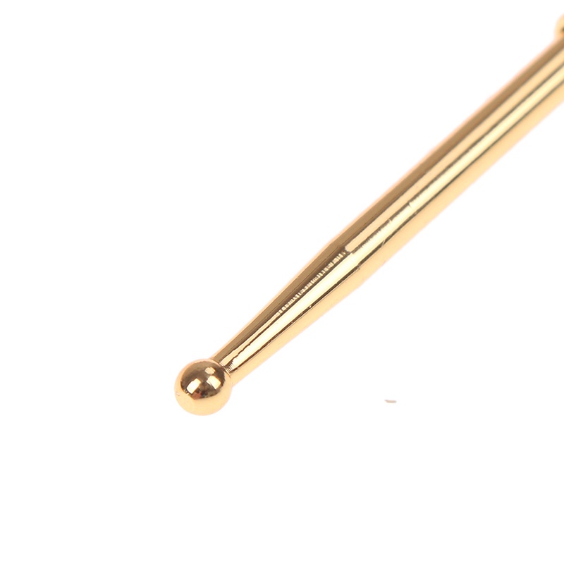 1 Dụng Cụ Mát Xa Tai Bằng Đồng