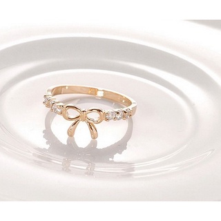 Simple bow diamond ring