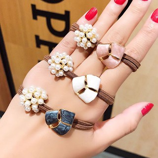 CT106 Cột tóc dây nâu hạt trắng xinh