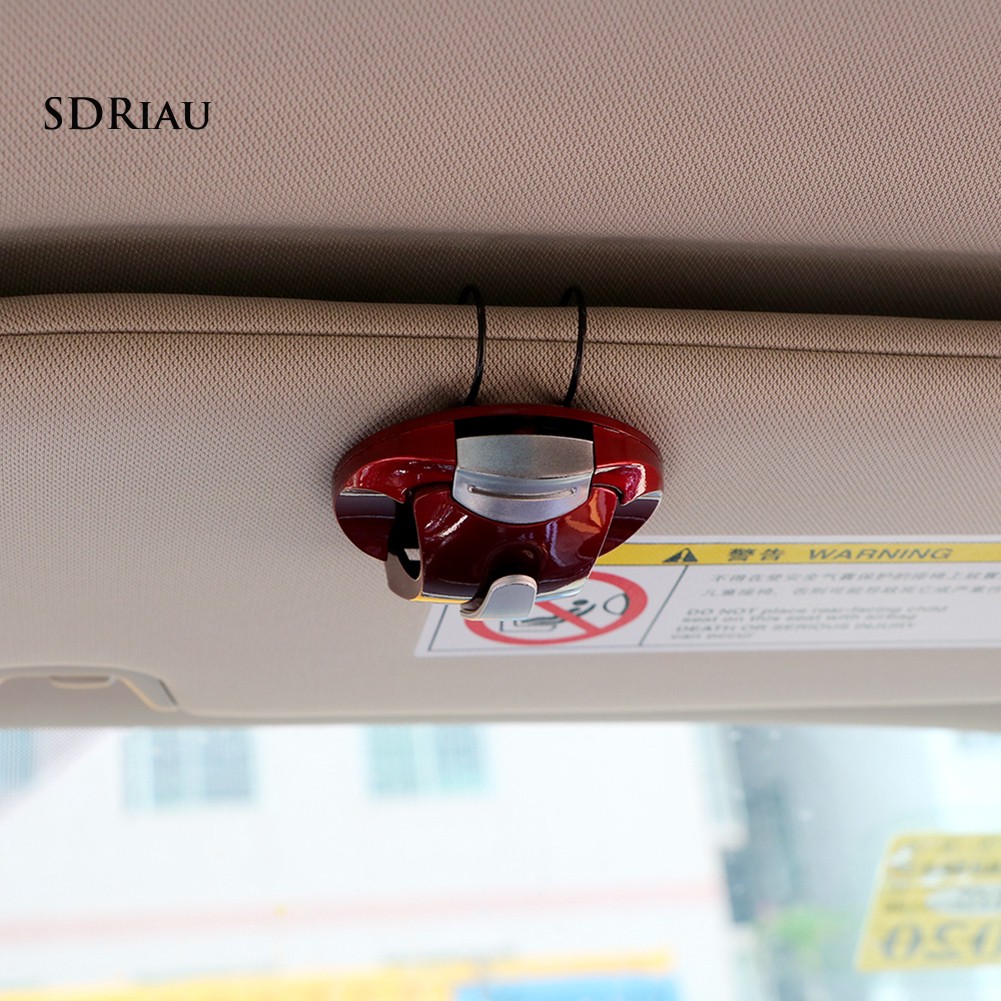 Kẹp gắn kính chắn gió che nắng trên xe hơi