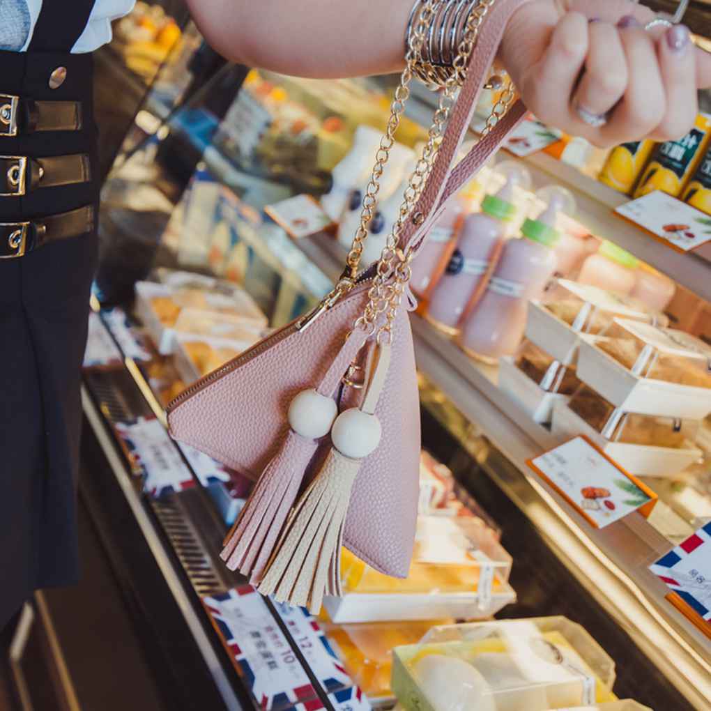 Túi đeo chéo da PU hình tam giác đính tua rua