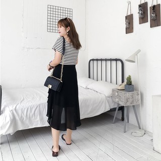 Đầm liền đen phối kẻ cho người béo mập