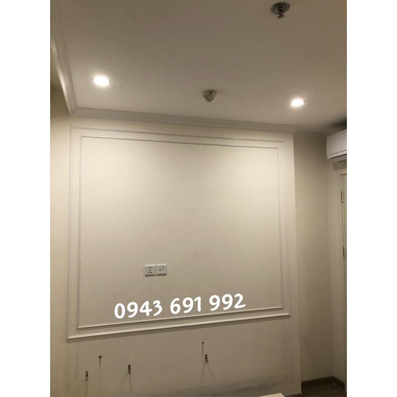 Thi công trang trí diện tường bằng Phào chỉ nhựa HQ màu trắng bản 3cm cân