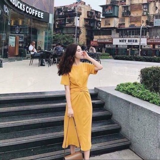Đầm xoắn eo