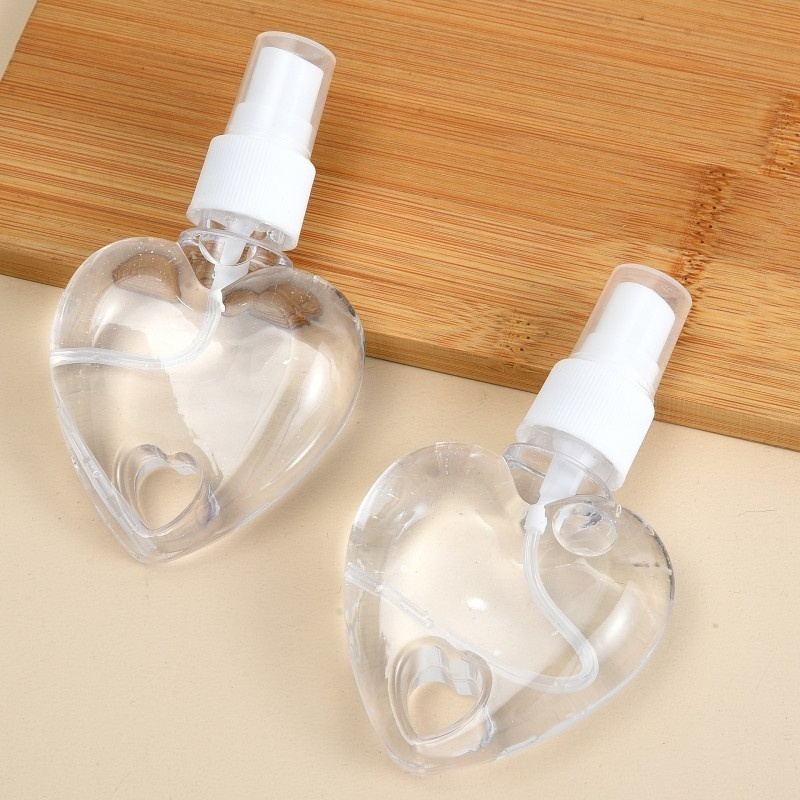 Bình Xịt Rỗng Trong Suốt Hình Trái Tim 50ML Có Móc Khóa Tiện Lợi