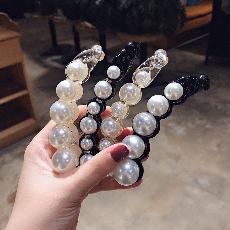 Kẹp tóc đính ngọc loại xoắn