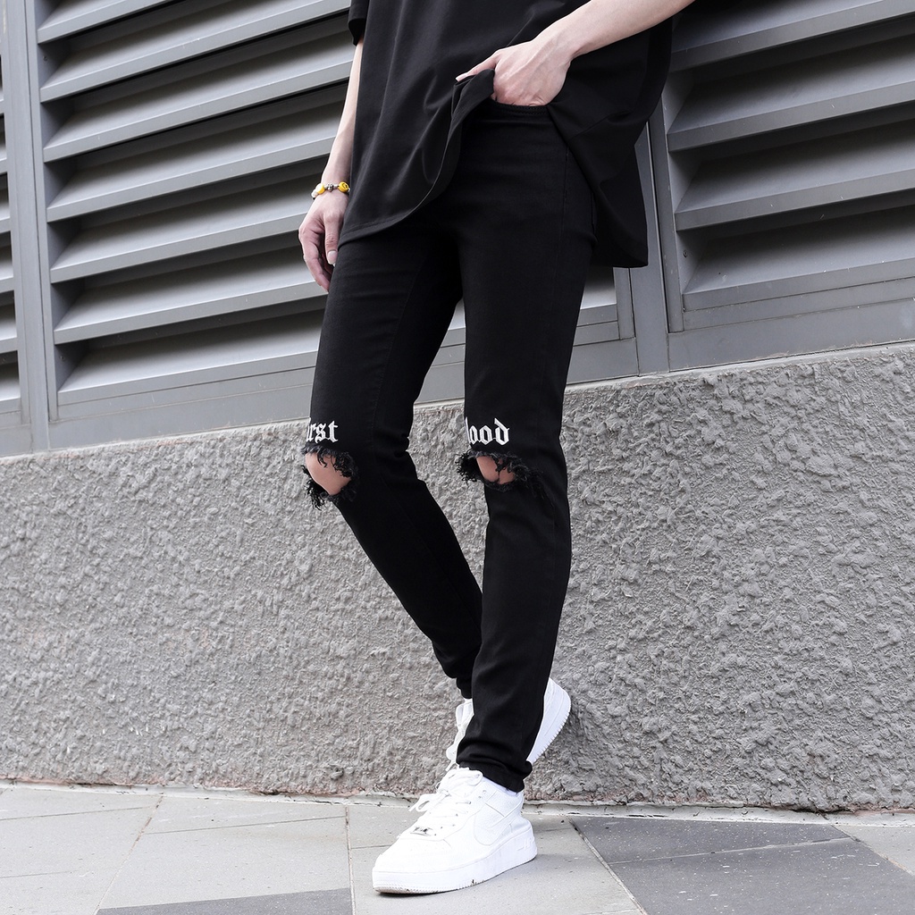 Quần Jean Nam Màu Đen Rách Gối Thêu Chữ First Blood Màu Trắng Chất Liệu Cotton Co Giãn Ống Ôm Form Skinny