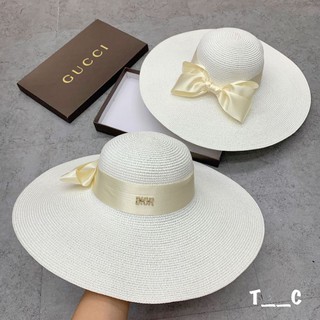 Mũ đi biển rộng vành nơ lụa